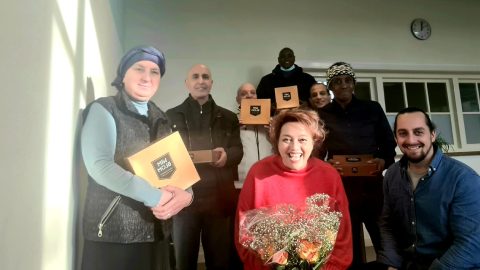 Shirley van den Kolk met haar cursisten.