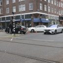 Botsing tussen personenauto en taxi in Rotterdam